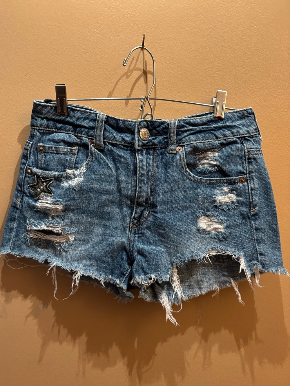 American Eagle Outfitters Distressed raw cut-off hem and Patches shorts size 2
